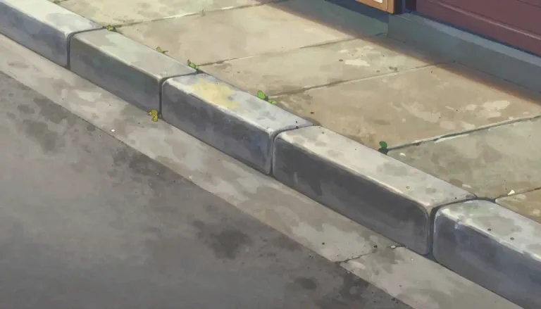 Visual representation of "kerbstone" - A stone set along the edge of a road to form a curb