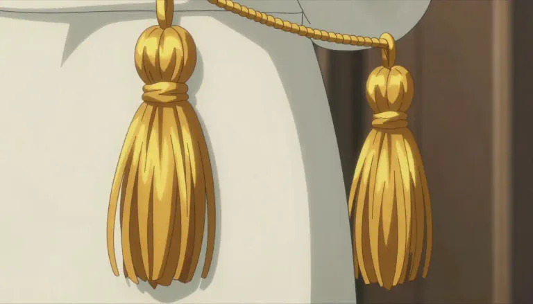 Visual representation of "tassel" - A hanging piece of string, rope or thread, typically used for decoration on clothing or curtains