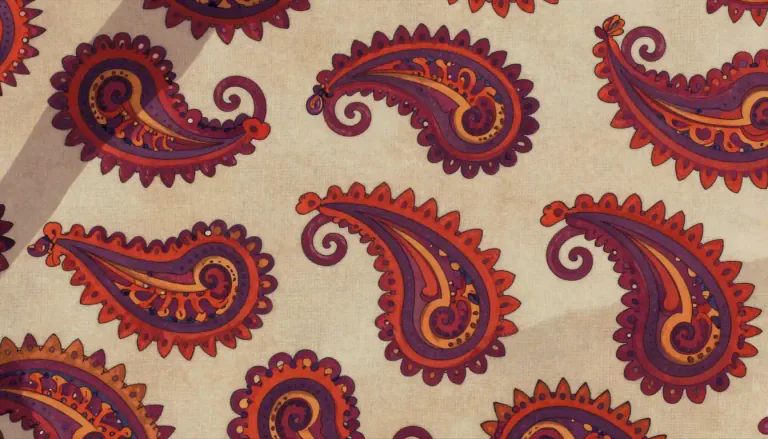 Visual representation of "paisley" - A pattern consisting of swirling shapes resembling a droplet; commonly seen in fabrics.