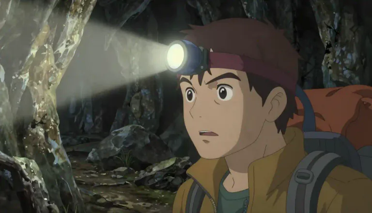 Visual representation of "headlamp" - A headlamp is a small light source that is worn on one's head, typically secured by a band or strap, used for illuminating an area in front of the wearer, especially in dark or dim conditions.
