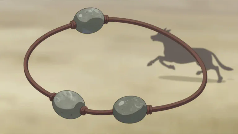 Visual representation of "bola" - A traditional throwing weapon made of weights on the ends of long cords, used for catching animals by entangling their legs.