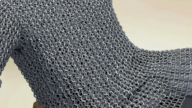 Visual representation of "chainmail" - Chainmail is a type of armor consisting of small metal rings linked together in a pattern to form a mesh.
