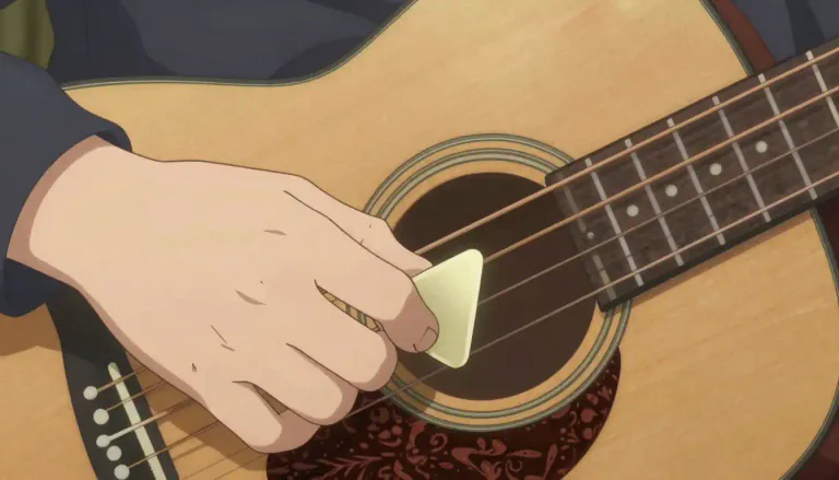 Visual representation of "plectrum" - A small flat tool used to pluck or strum a stringed musical instruments like a guitar or a mandolin.