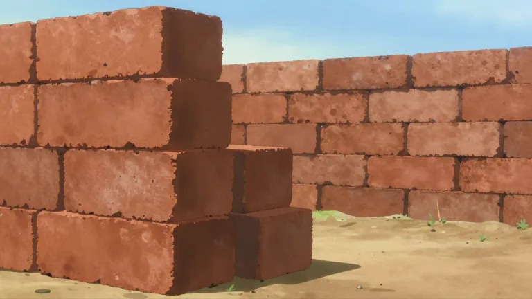 Visual representation of "laterite" - A reddish clay that can be used to make bricks and as a construction material.