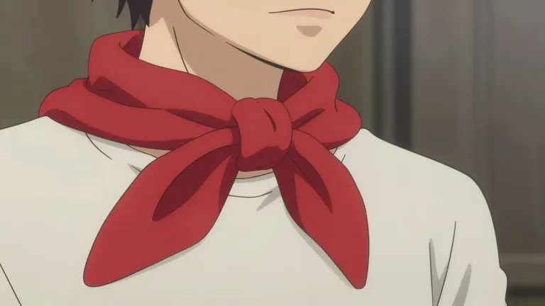 Visual representation of "neckerchief" - A piece of fabric worn around the neck, often for decoration or to keep the neck warm