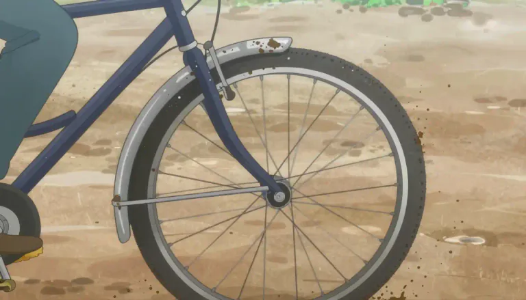 Visual representation of "mudguard" - A mudguard is a part of a bicycle or motor vehicle that covers the wheels to prevent mud and water from splashing onto the rider or the body of the vehicle.