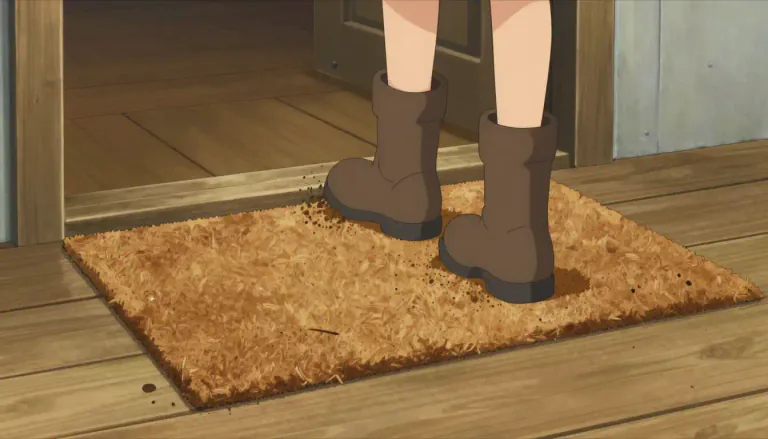 Visual representation of "mat" - A flat piece of material put on a floor, especially to place your feet on.