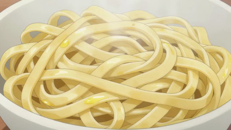 Visual representation of "linguini" - A type of long, flat pasta that is wider than spaghetti and narrower than fettuccine.