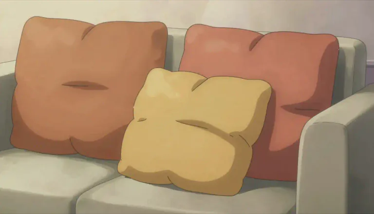 Visual representation of "cushion" - A soft object made of cloth and stuffing to make sitting or lying down more comfortable