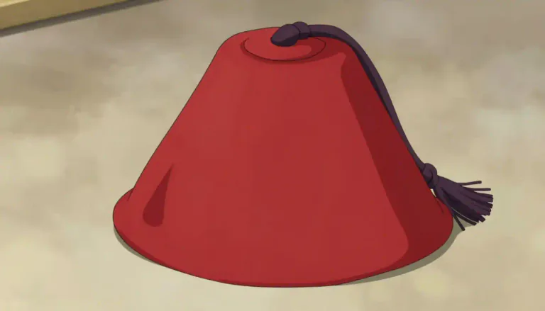 Visual representation of "tarboosh" - A cone-shaped hat worn in Middle East, often with a silk or wool tassel hanging from the top.