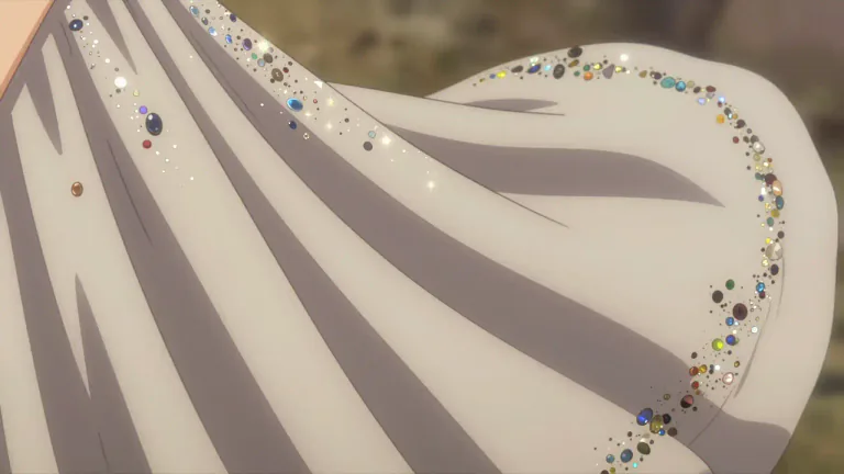 Visual representation of "spangle" - A small, shiny piece of metal or plastic, used to decorate clothes