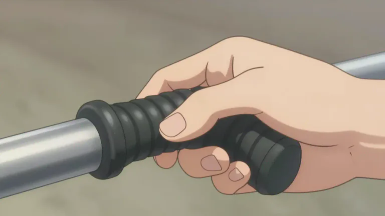 Visual representation of "handgrip" - A part of an object that is designed to be held by the hand.