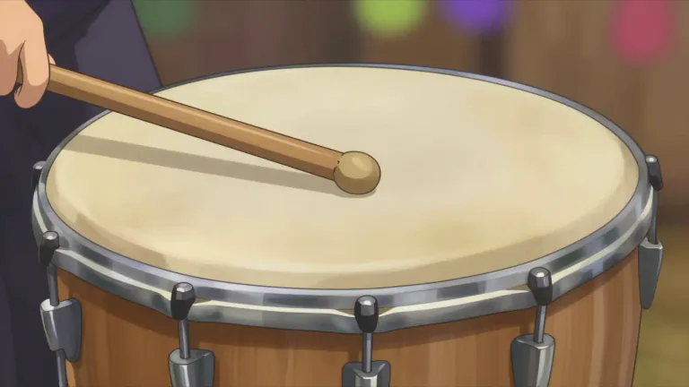 Visual representation of "timbale" - A timbale is a shallow, single-headed drum typically played with sticks and used in various Afro-Caribbean music styles.