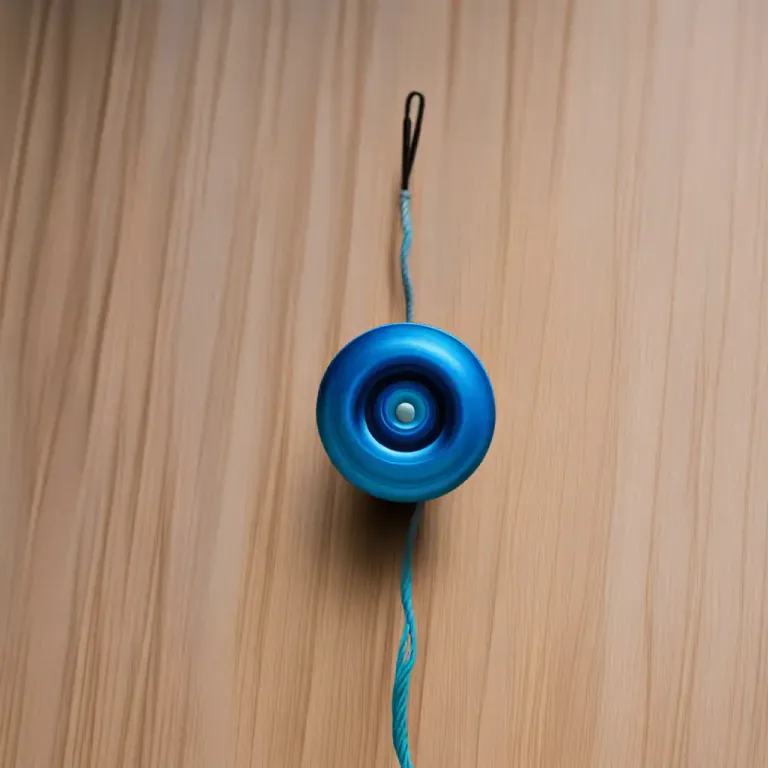 Visual representation of "axle" - In certain rotating toys or instruments, the central spindle around which the item turns