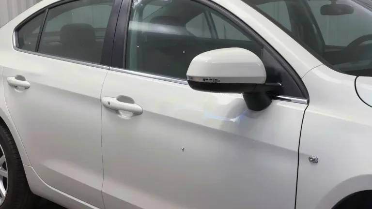 Visual representation of "clearcoat" - A clear, transparent coating applied over paint or a surface to provide protection and enhance appearance.
