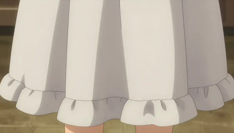 Visual representation of "frill" - A decorative edge made of cloth, paper, etc., that is folded in small and regular waves