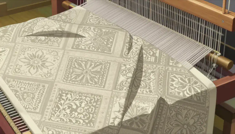 Visual representation of "jacquard" - A type of fabric that features a woven pattern, created by a special loom.