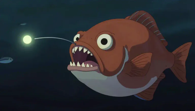 Visual representation of "anglerfish" - A type of fish with a bioluminescent lure on its head, used to attract prey.