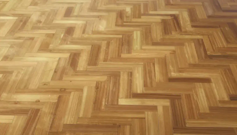 Visual representation of "parquet" - A type of wooden flooring made of small, geometrically arranged pieces.