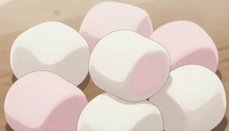 Visual representation of "marshmallow" - A sweet, soft, white or pink piece of candy that is often used in cooking or baking.
