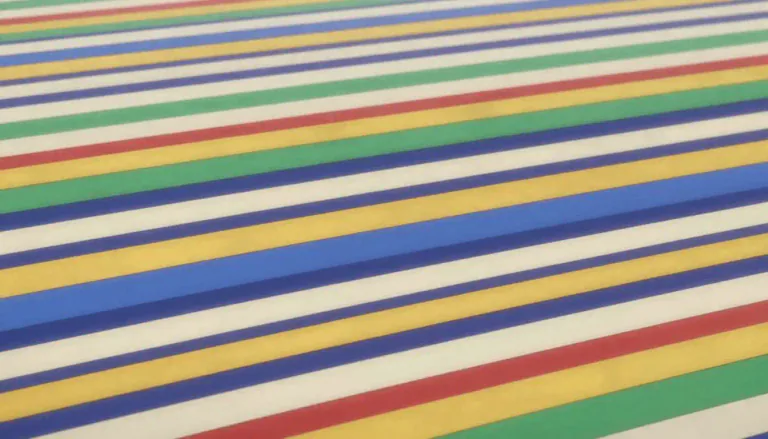 Visual representation of "stripe" - A long thin line or band in a different color or texture from the surface it is on.