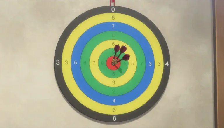 Visual representation of "dartboard" - A circular board with numbered sections on which players throw darts to score points.